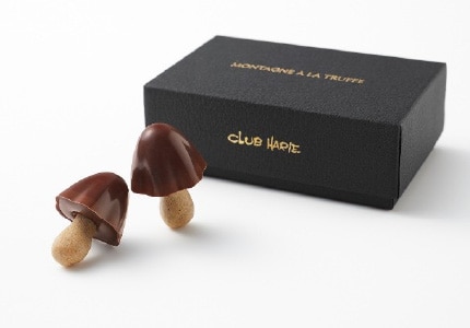 画像：クラブハリエ「MONTAGNE À LA TRUFFE (モンターニュ・ア・ラ・トリュフ)」（2個）と商品パッケージ